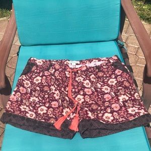 Beautiful trendy Sundance shorts with orange tie.